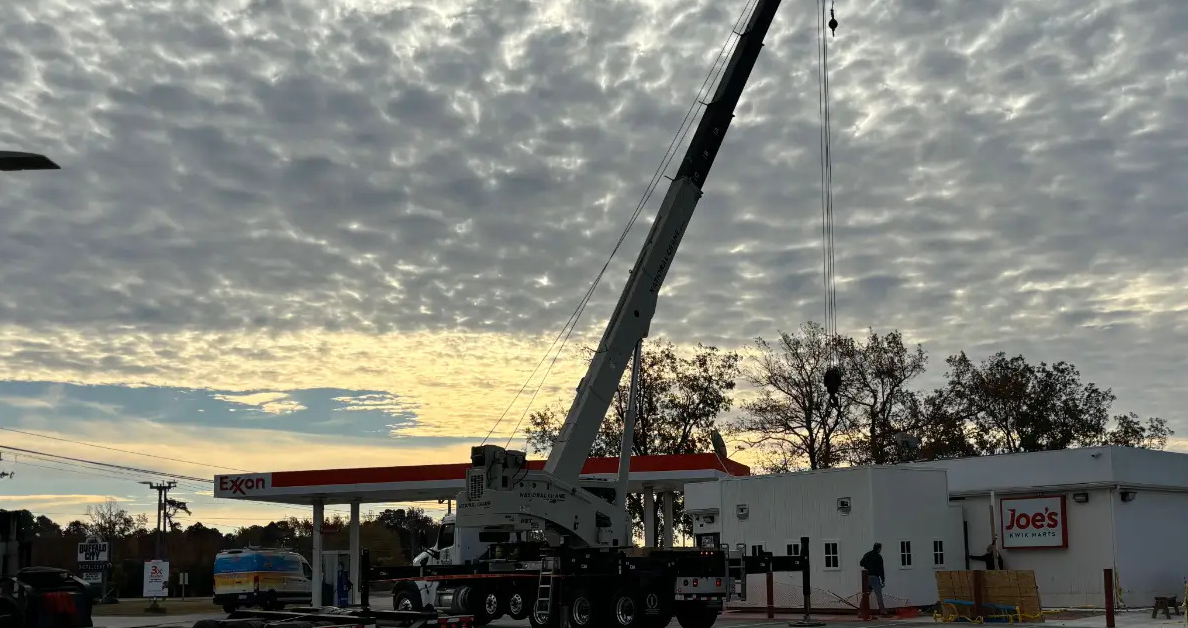 Crane operator checking wind speed before a lift in Outer Banks, NC